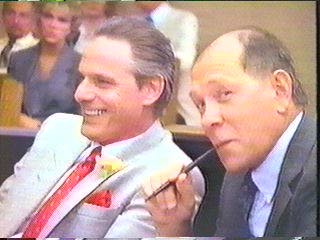 [Haggis and his laywer smiling]