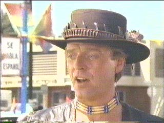 [Hammer posing as Cowboy Cody]