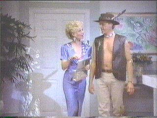 [Mrs. Cody and Sledge entering her suite]