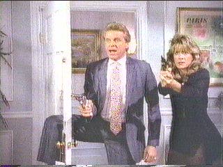 [Hammer and Doreau pointing their guns]