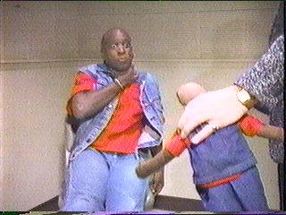 [Tauber and doll both choking]