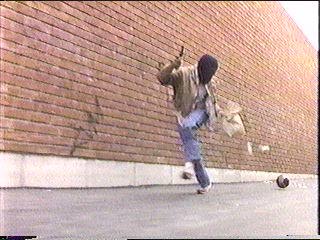 [suspect running away from bowling ball]