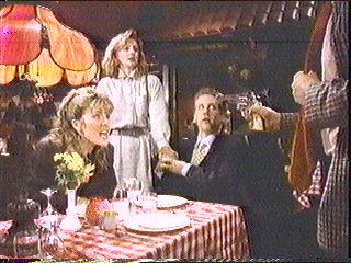 [Sledge pointing gun at ex-wife]