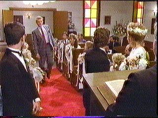 [Sledge limping into church]