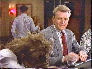 [Dori slumped over bar counter]