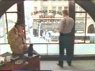 [Sledge and stranger in new office]