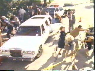 [the crowd fleeing the scene]