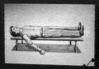 [sketch of man lying down]