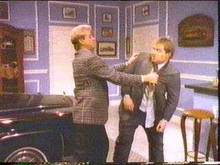 [Hammer hastling the aide]